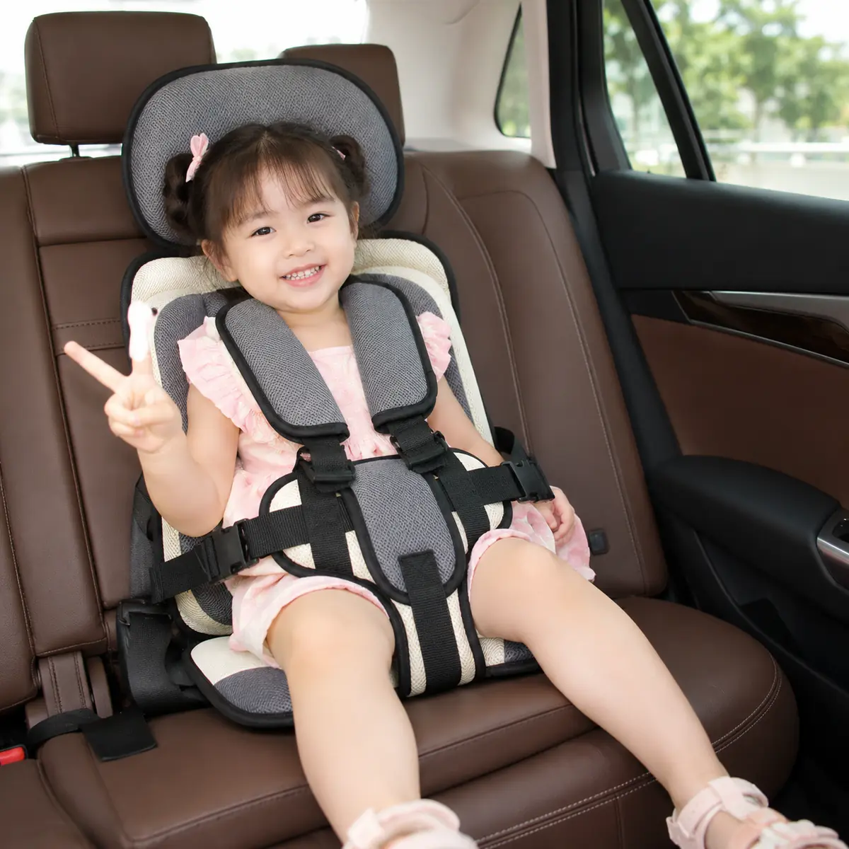Đệm Ghế An Toàn Cho Bé Đi Ô Tô – Gọn Nhẹ Có Dây Đai Cố Định